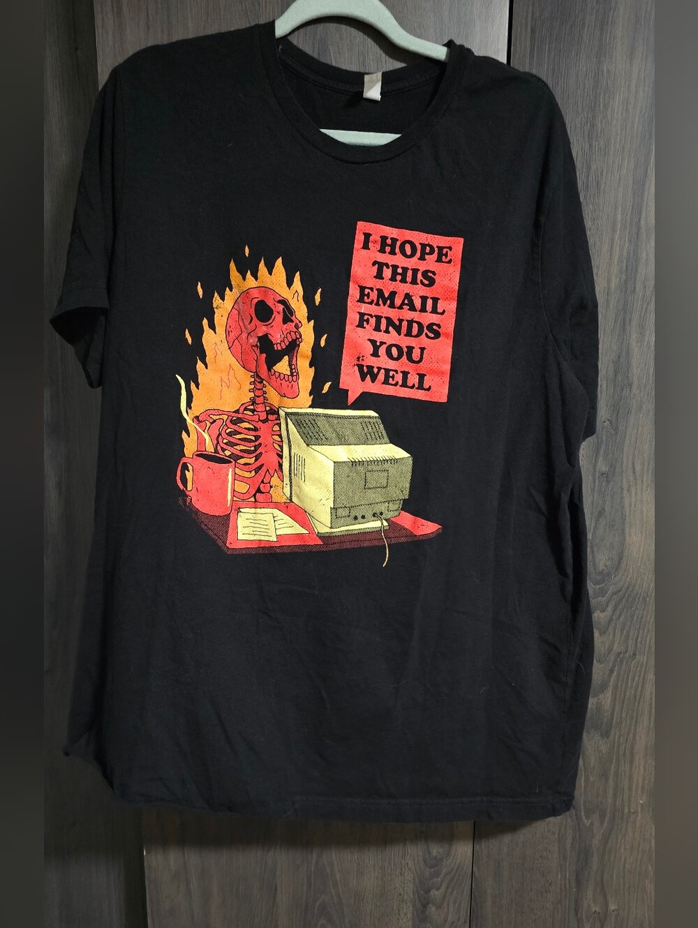 Black Graphic Tee with Red Flame Skeleton Office Design